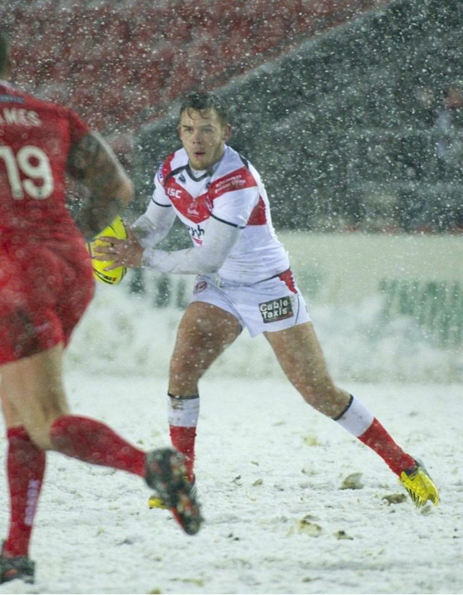 Dom playing rugby league
